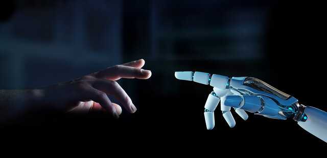 Person and robot touching hands
