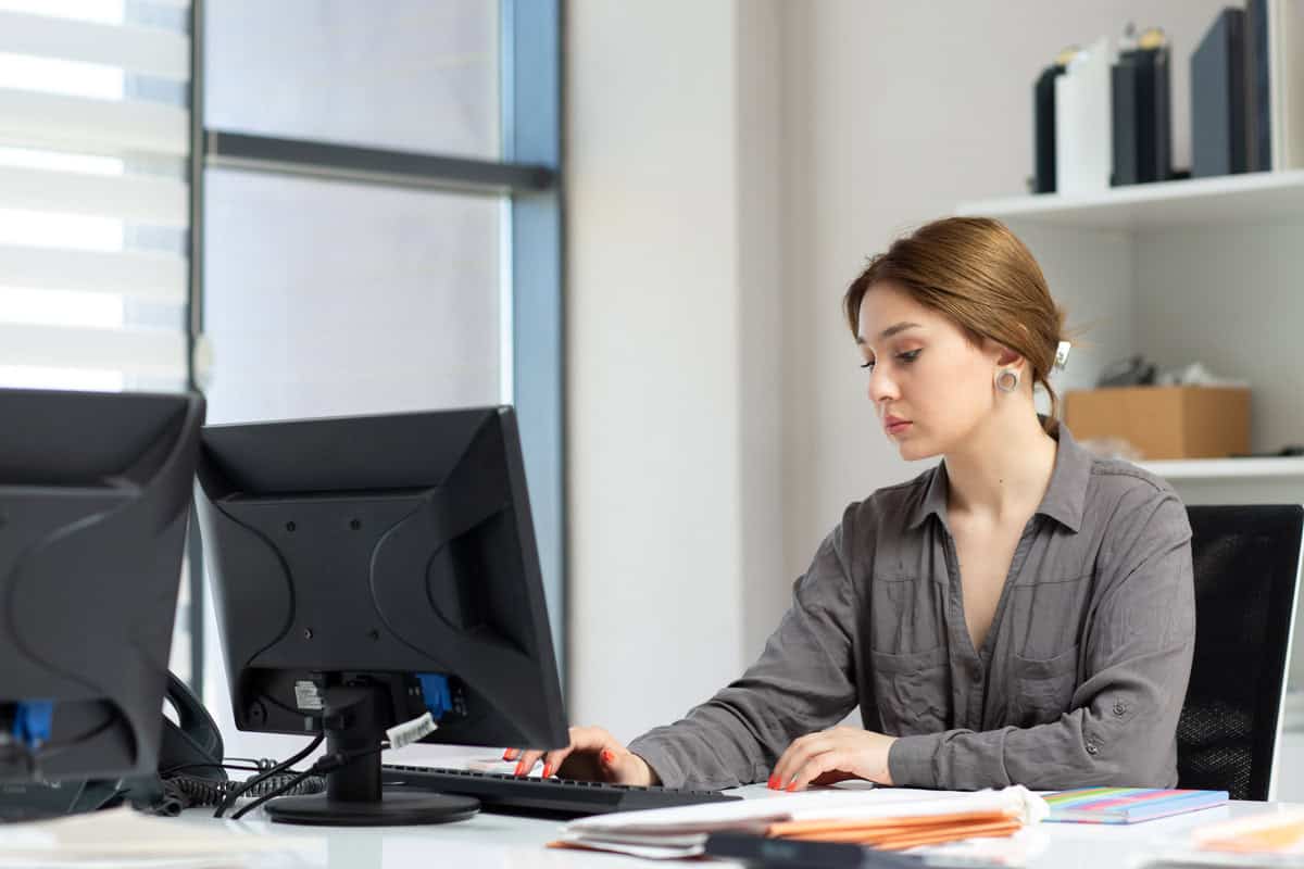 Assistant working on computer