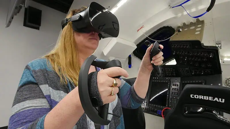Woman using VR glasses