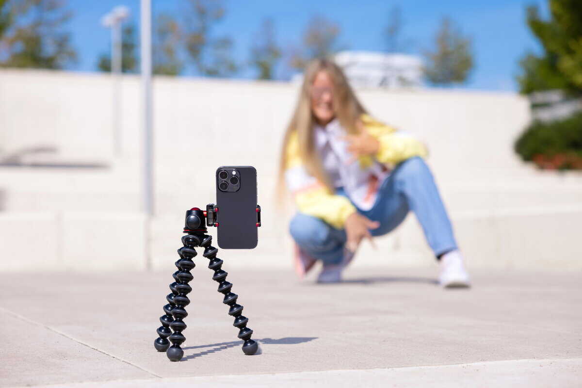 Girl making video of herself on mobile phone. testimonial